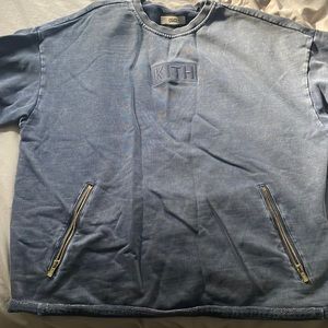 Kith Pullover with side zipper pockets.